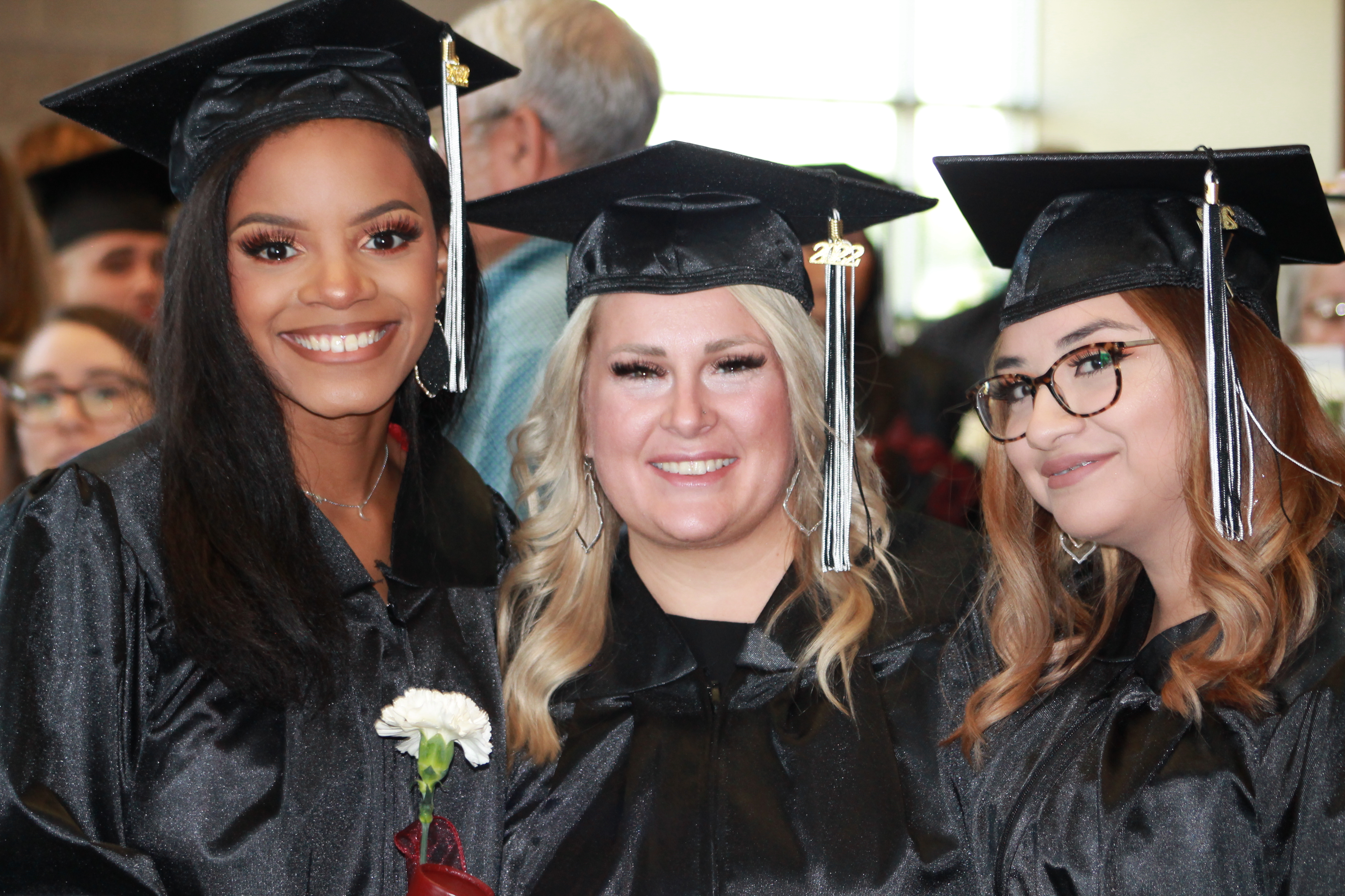 Commencement - 3 students.JPG